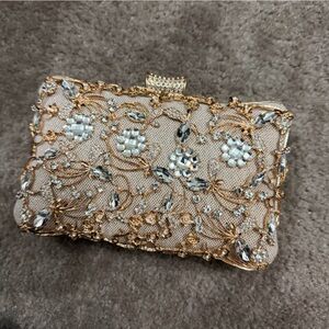 Elegant Gold and Silver Embellished Clutch